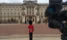 Outside Buckingham Palace awaiting the Queen's appearance on the balcony for a flypast at Trooping the Colour